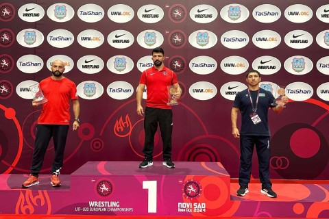 Azerbaijani wrestlers on the podium at the European Championship