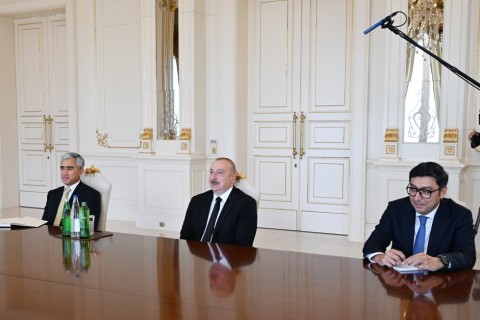 President Ilham Aliyev receives President and CEO of Formula 1, his adviser and a British supermodel - PHOTO