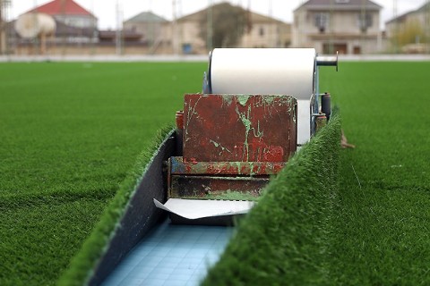 Binə stadionunda süni ot örtüyü dəyişdirilir - FOTO