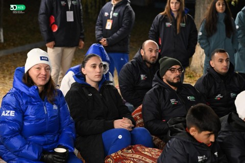 Minister Farid Gayibov meets athletes around the bonfire at the III Sports Festival - PHOTO - VIDEO