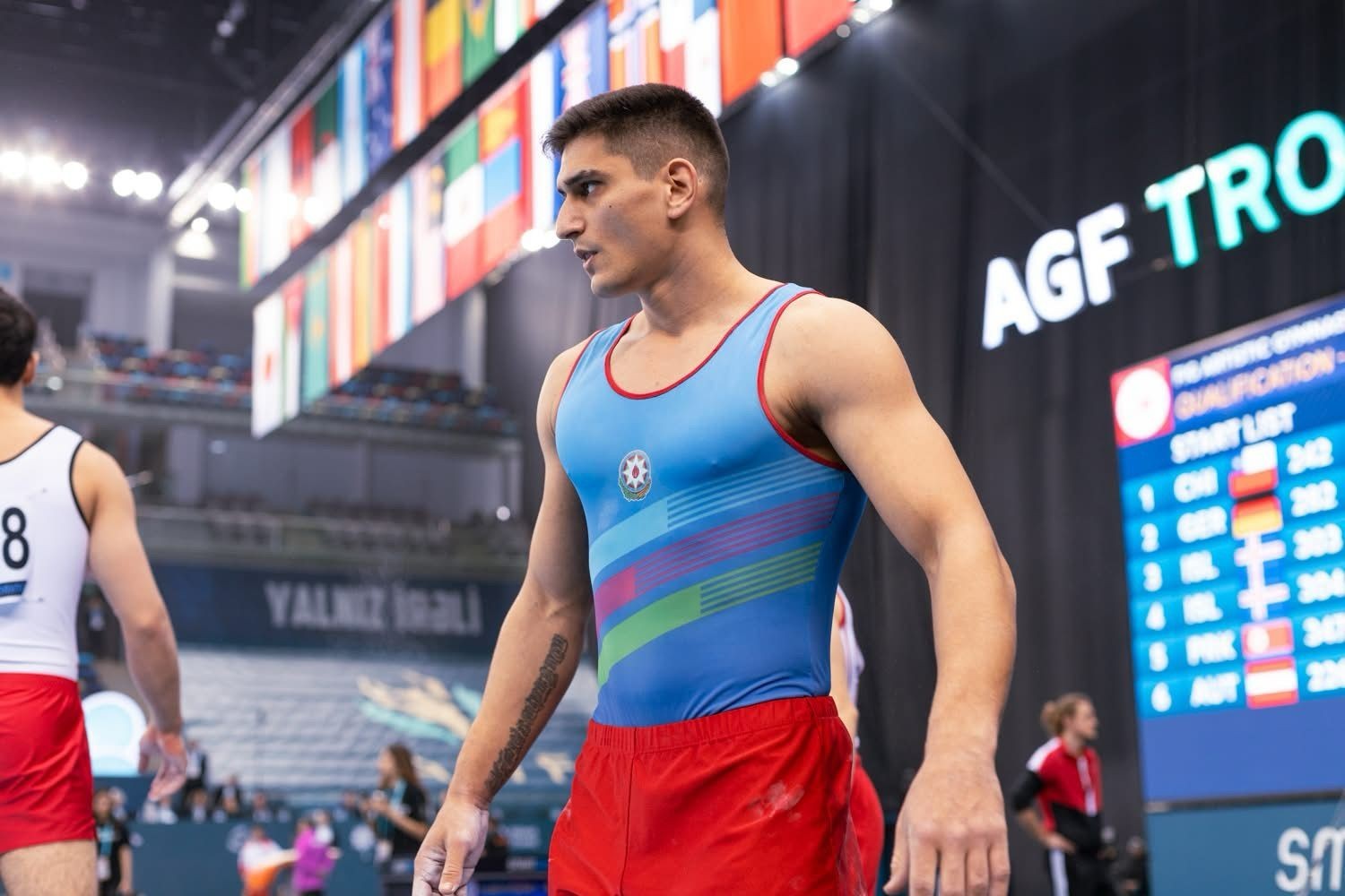 Who will Agharzayev and Tikhonov compete against in the World Cup finals?